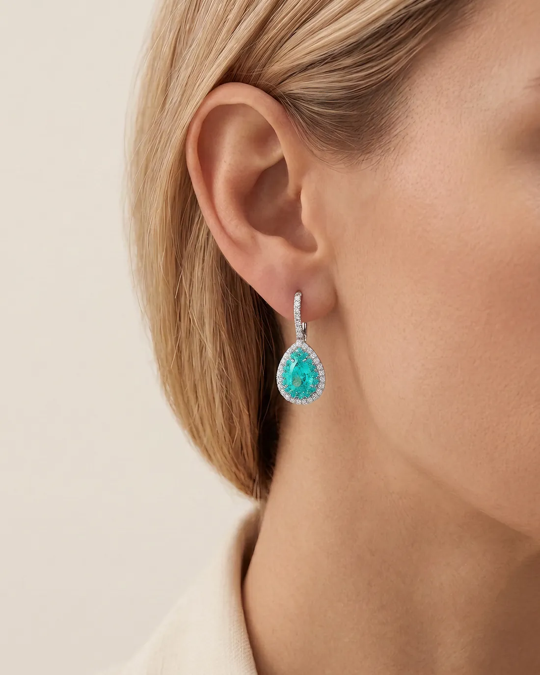 ORTIGAS Paraiba Pear Drops, серьги, в ухе