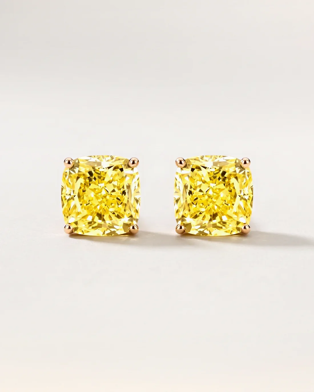ORTIGAS Yellow Cushion Studs, серьги, вид спереди