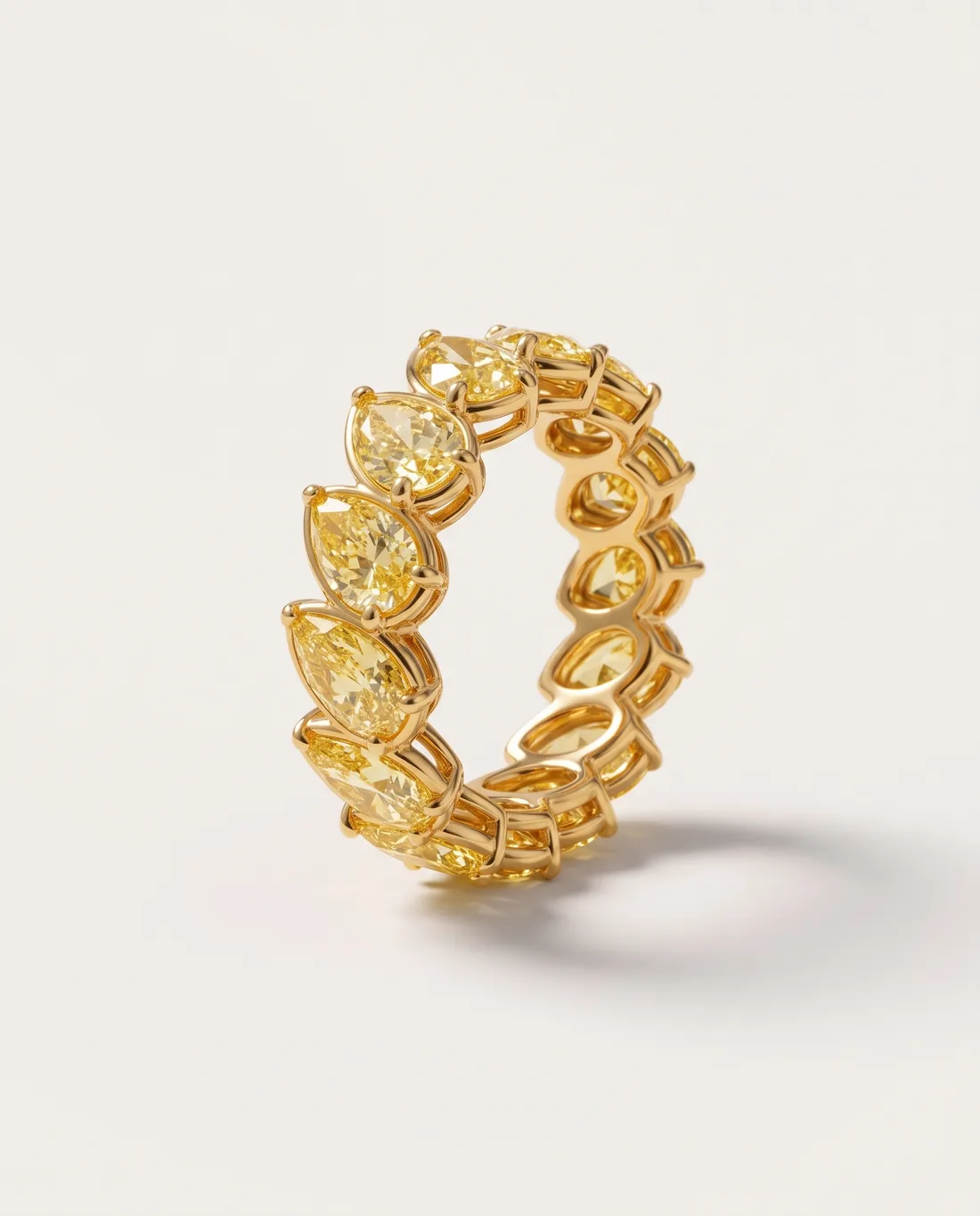 ORTIGAS Yellow Pear Eternity, кольцо, вид в три четверти